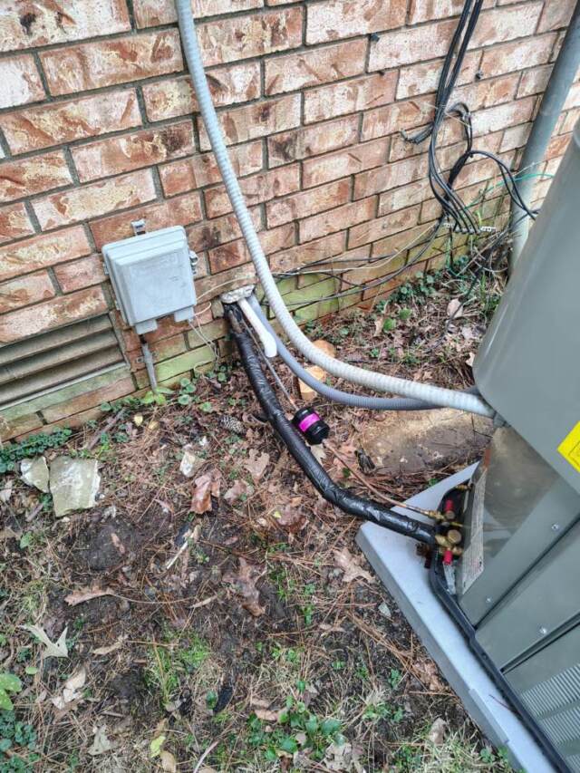 Repaired wire and ran inside conduit, blocked hole